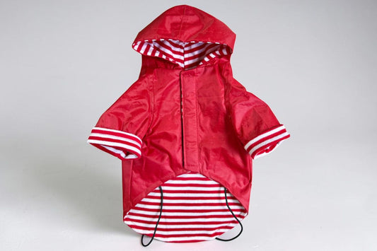 Foto 1
Impermeable rojo para perro con gorro, vista frontal fondo blanco