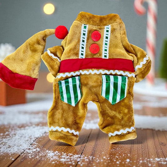 Disfraz navideño para perro tipo galleta de jengibre con gorro rojo y botones decorativos.
