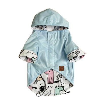Foto 1
Impermeable azul cielo para perro con gorro, vista frontal completa