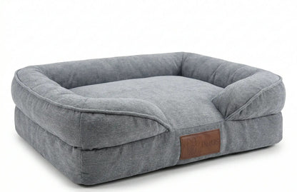 Cama para perro marca PetUs color gris Oxford fabricada en mezclilla premium ultra resistente.