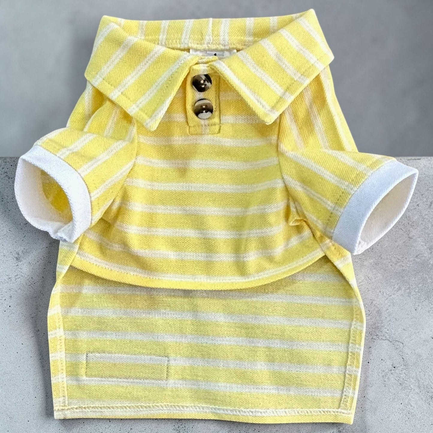 Playera polo amarilla a rayas para perro ropa de primavera.